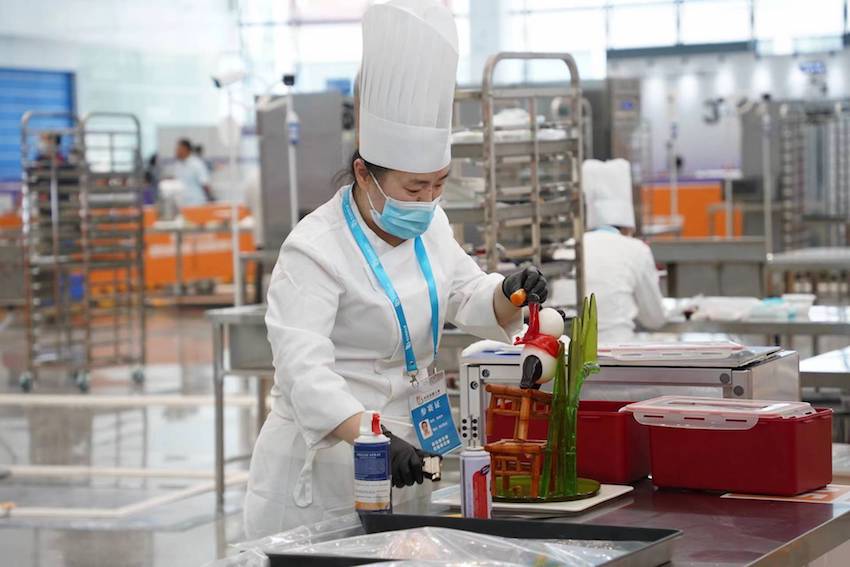 選手全力以赴展示四川工匠技能風采。四川人社供圖