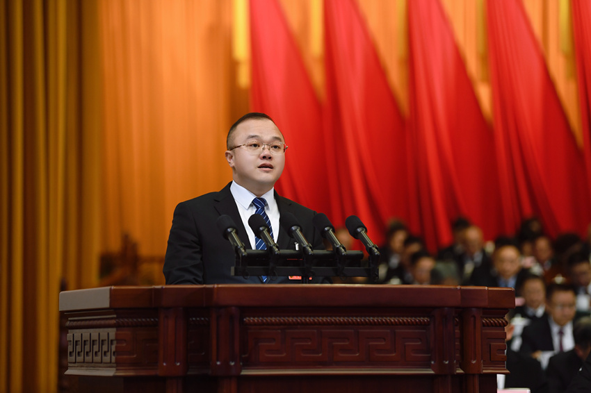 伍亮吉代表民進四川省委會作大會發言。受訪者供圖