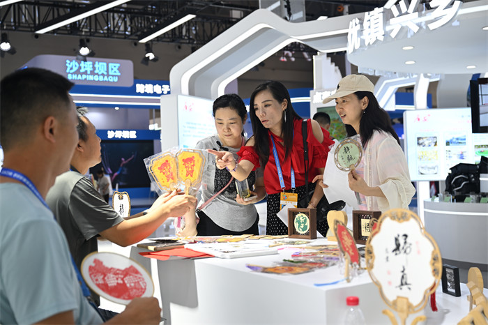 西洽會上的廣安展臺?？到謹z